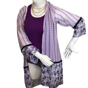 True Cafton. Purple, navy and a mauve.